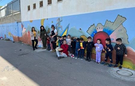 جدارية " بين الثقافة والرياضة " في مدرسة يني الثانوية في كفرياسيف